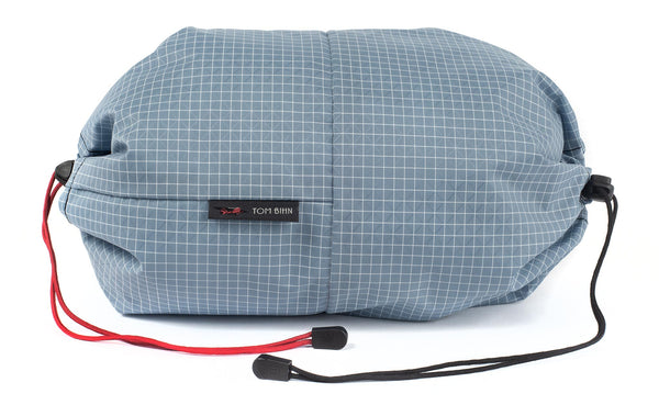 An Aeronaut 45 Travel Laundry Stuff Sack in Tidal (pale blue with white grid) 200 Halcyon.